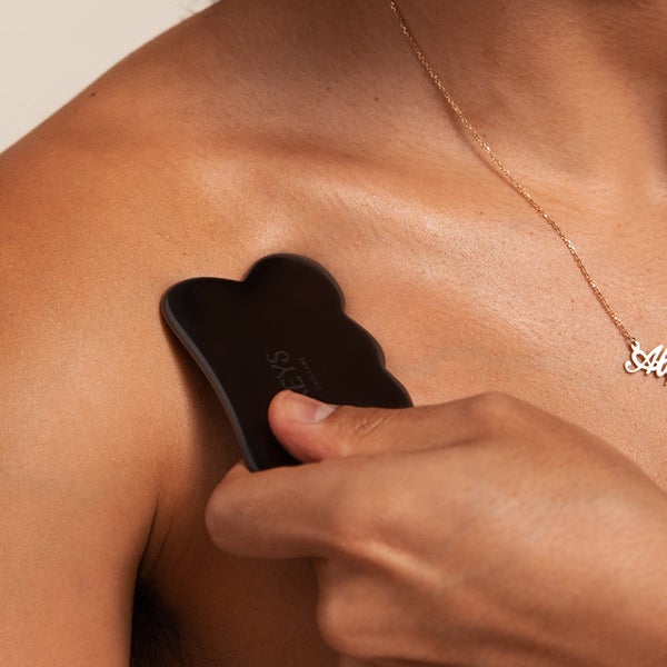 Alicia Keys Using Obsidian Stone Gua Sha
